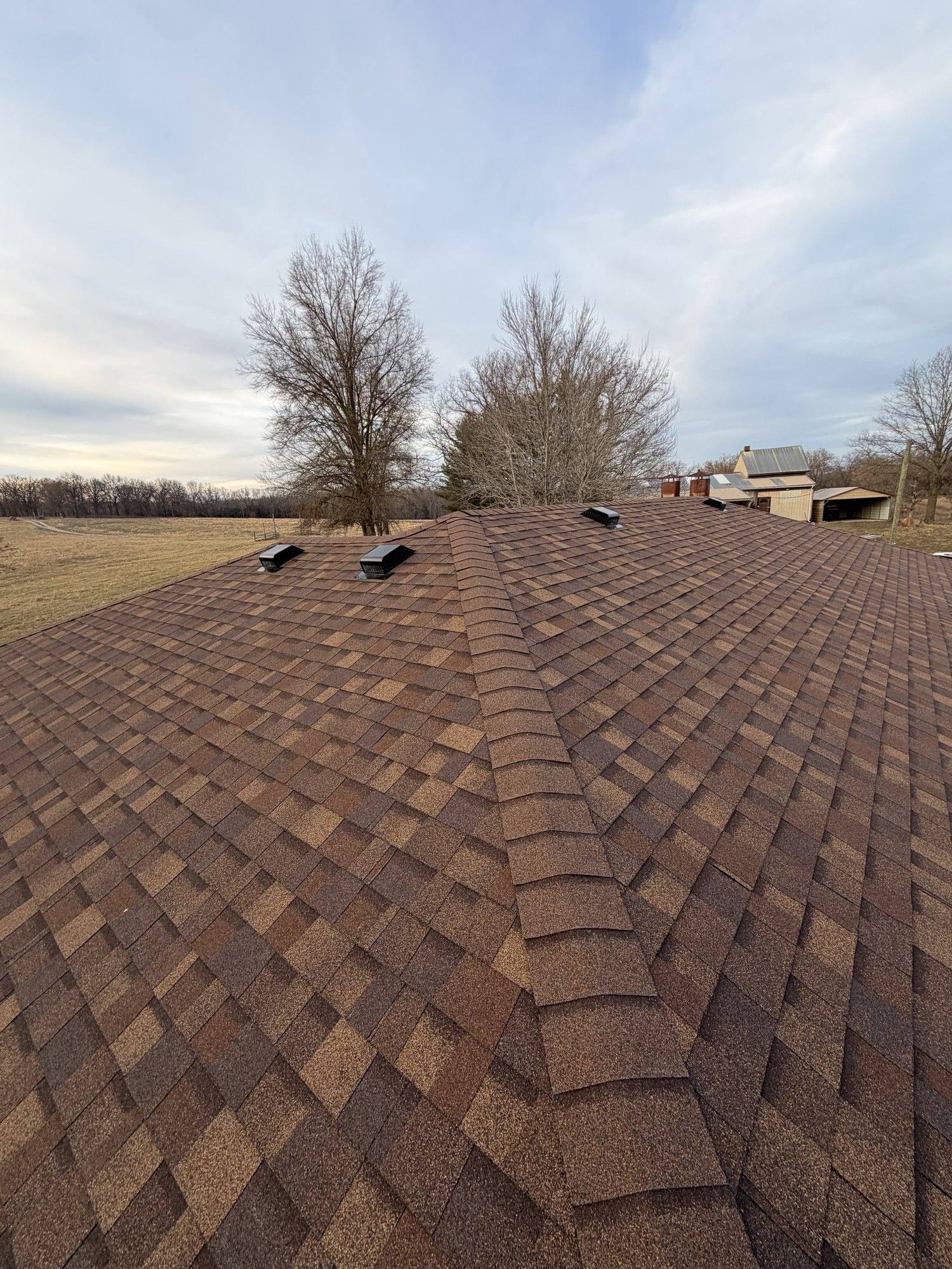 Close-up of premium architectural shingles installed on a Sedalia, MO residential roof