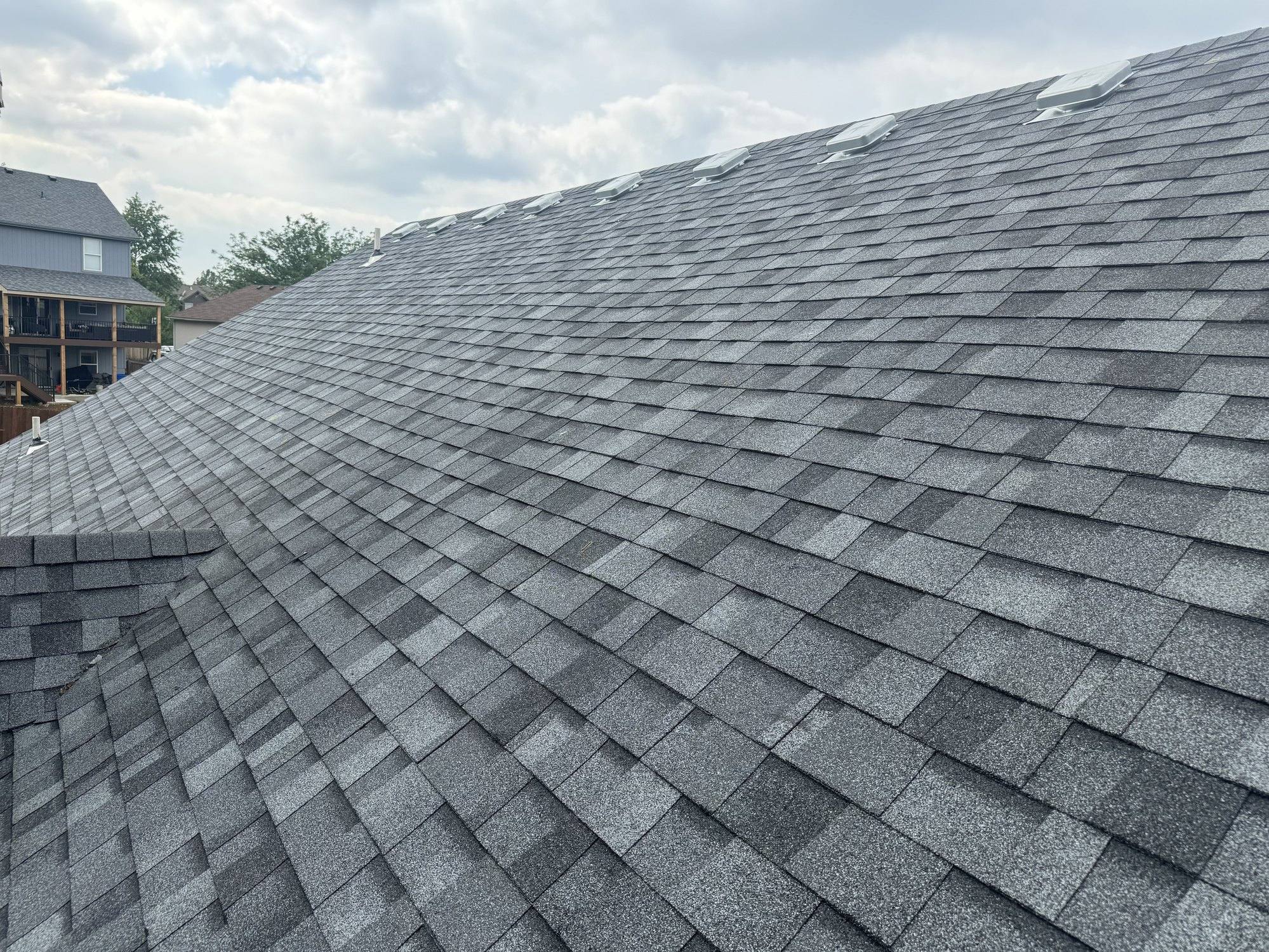 Brand-new architectural shingle roof installation in progress in Sedalia, Missouri